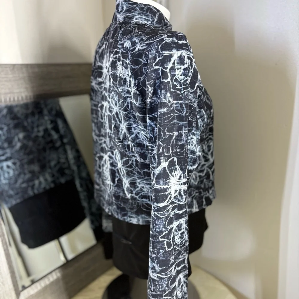 Spyder Black and White Running Jacket with layered Athletic Silhouette
